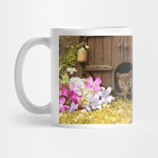 George the mouse in a log pile House spring flowers at the door Mug